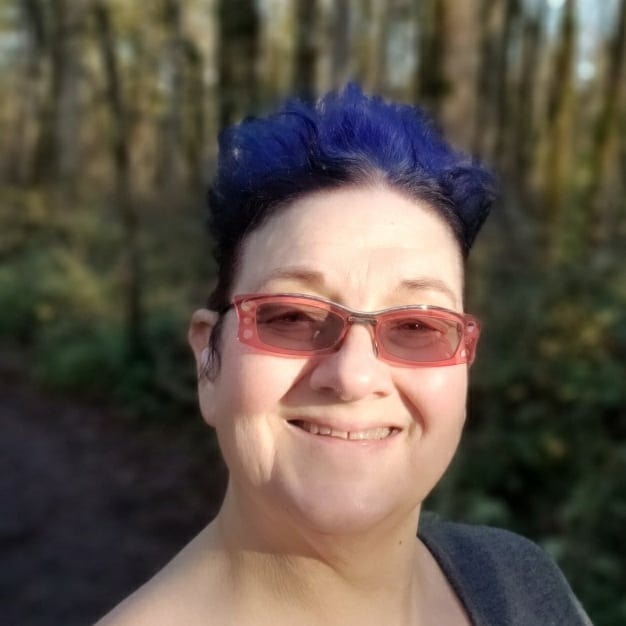 Woman with in sunglass with beautiful hair color.